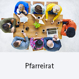 Pfarreirat; Symbolbild: Eine kleine Runde tagt an einem Tisch